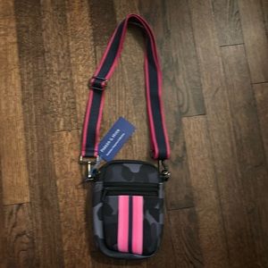 Parker & Hyde. Black/gray camo camera crossbody bag with pink stripe.